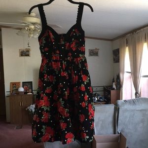 Retro styled rose dress with pockets